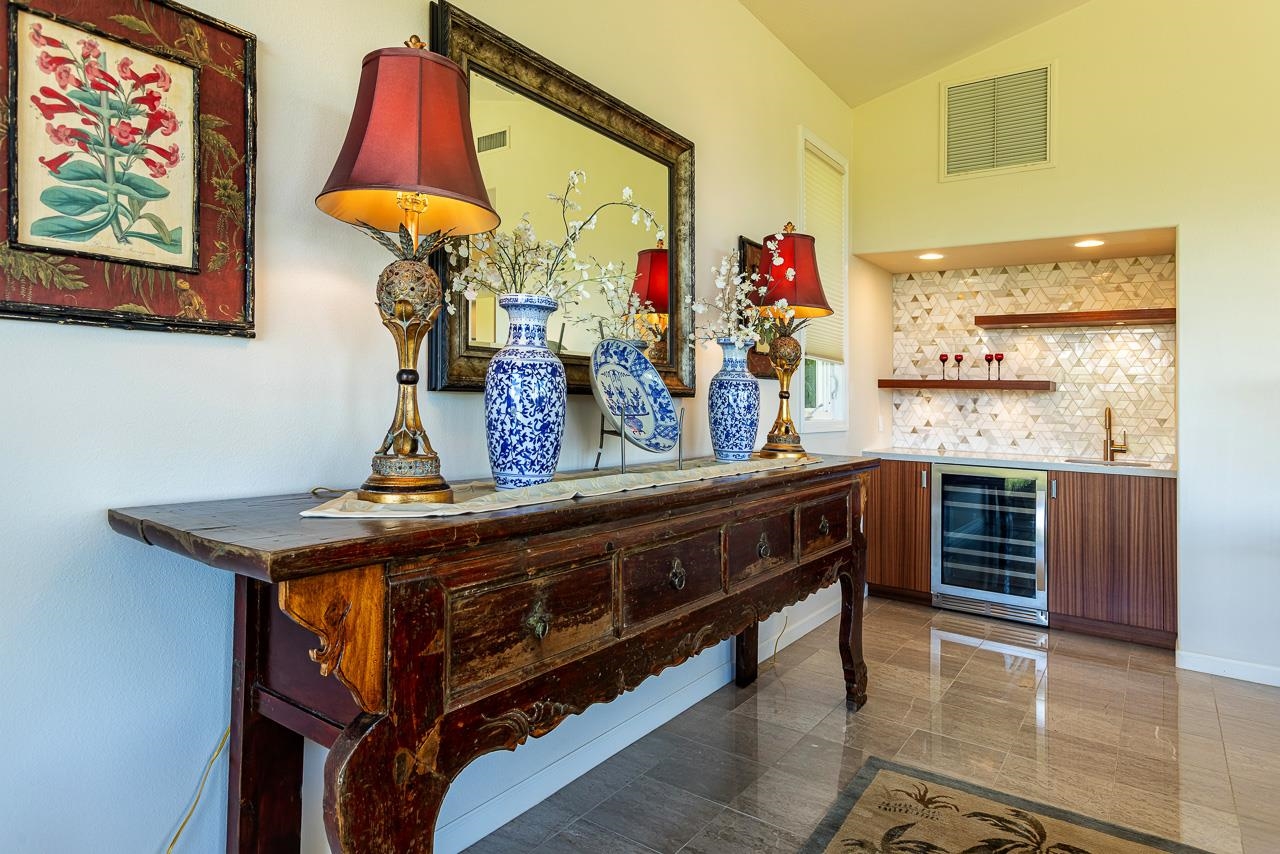 164 West Ikea Moku Place Kihei, HI 96753 - Photo 13 of 49 a view of kitchen with stainless steel appliances granite countertop a stove and a sink