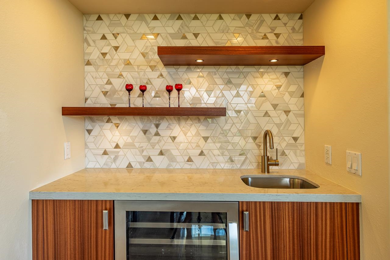 164 West Ikea Moku Place Kihei, HI 96753 - Photo 14 of 49 a bathroom with a sink and a mirror