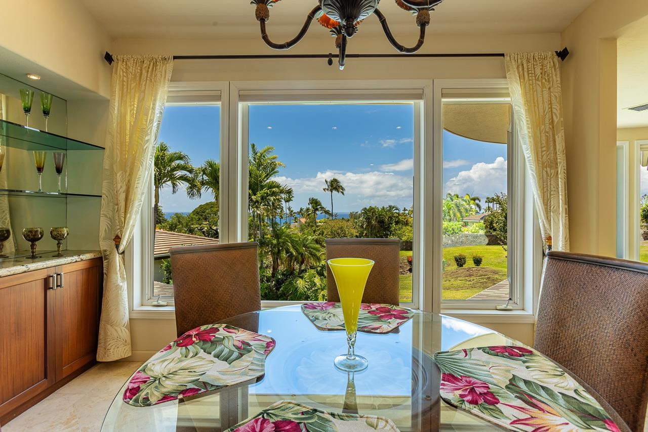 164 West Ikea Moku Place Kihei, HI 96753 - Photo 23 of 49 a living room with furniture and a floor to ceiling window