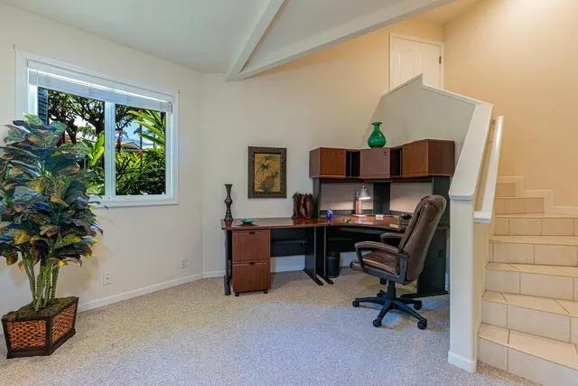 a bedroom with a bed and furniture