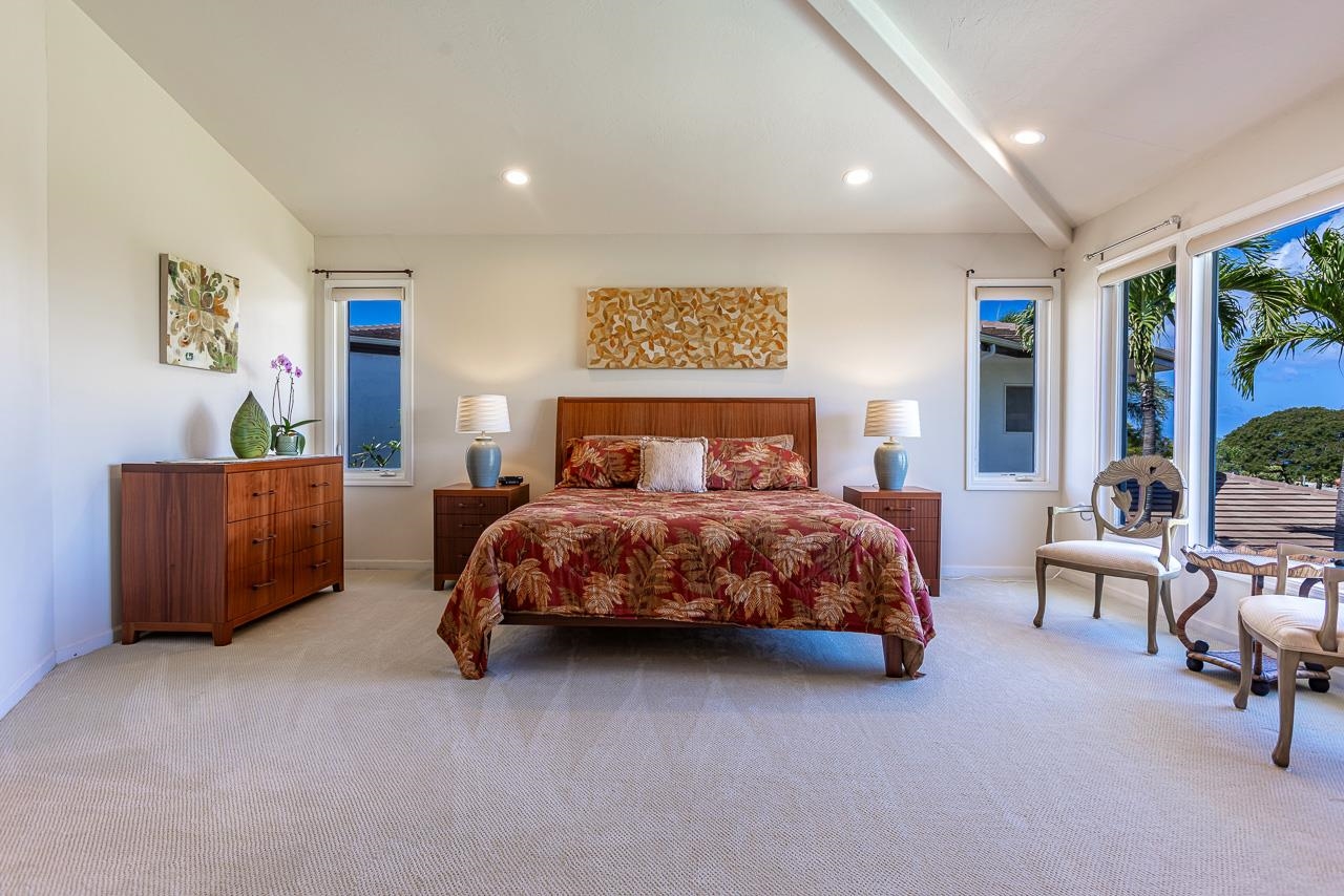 164 West Ikea Moku Place Kihei, HI 96753 - Photo 25 of 49 a bedroom with a bed and furniture