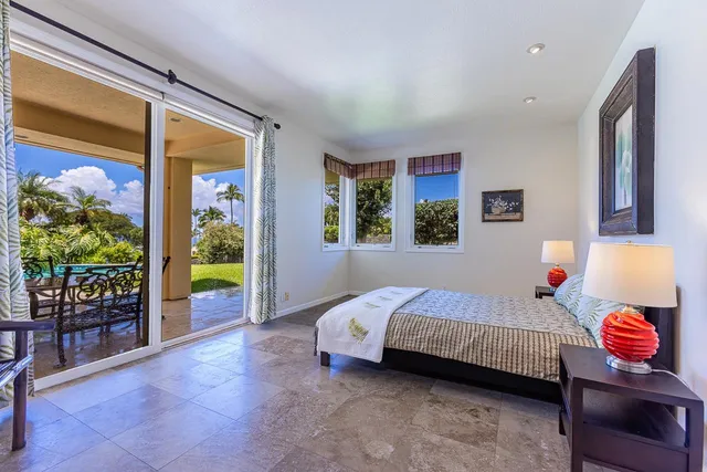 a bedroom with a bed and a cabinets