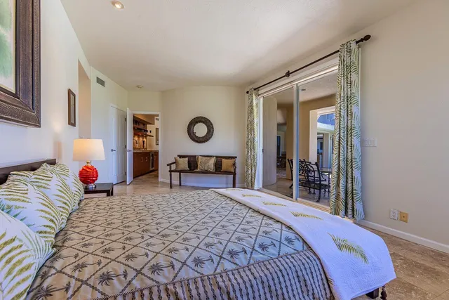 a spacious bathroom with a granite countertop sink mirror and double