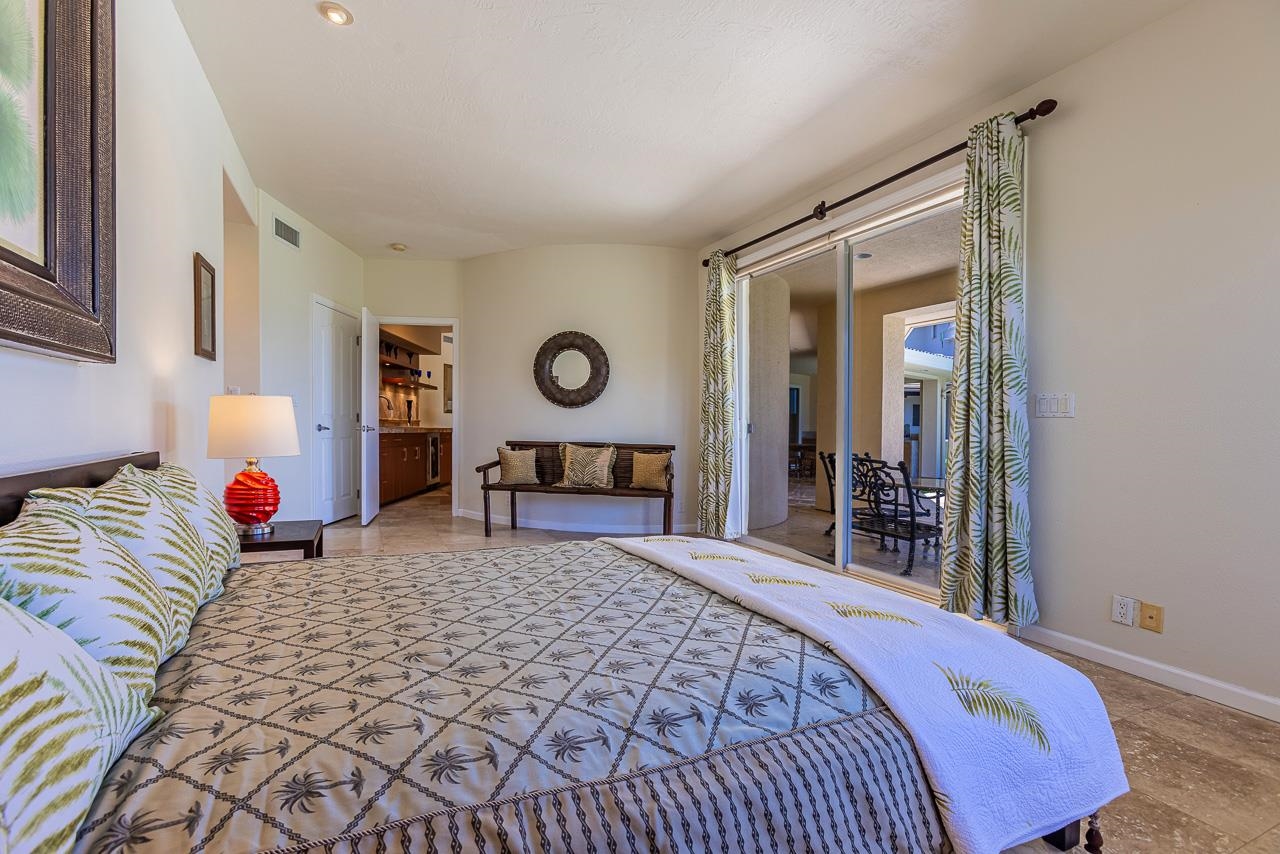 164 West Ikea Moku Place Kihei, HI 96753 - Photo 35 of 49 a bedroom with a bed and a cabinets