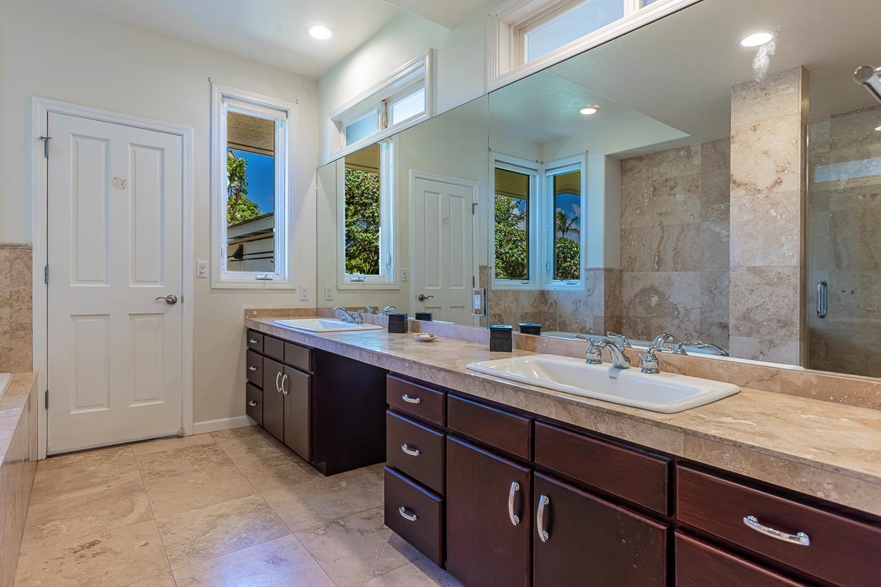 164 West Ikea Moku Place Kihei, HI 96753 - Photo 36 of 49 a spacious bathroom with a granite countertop sink mirror and double