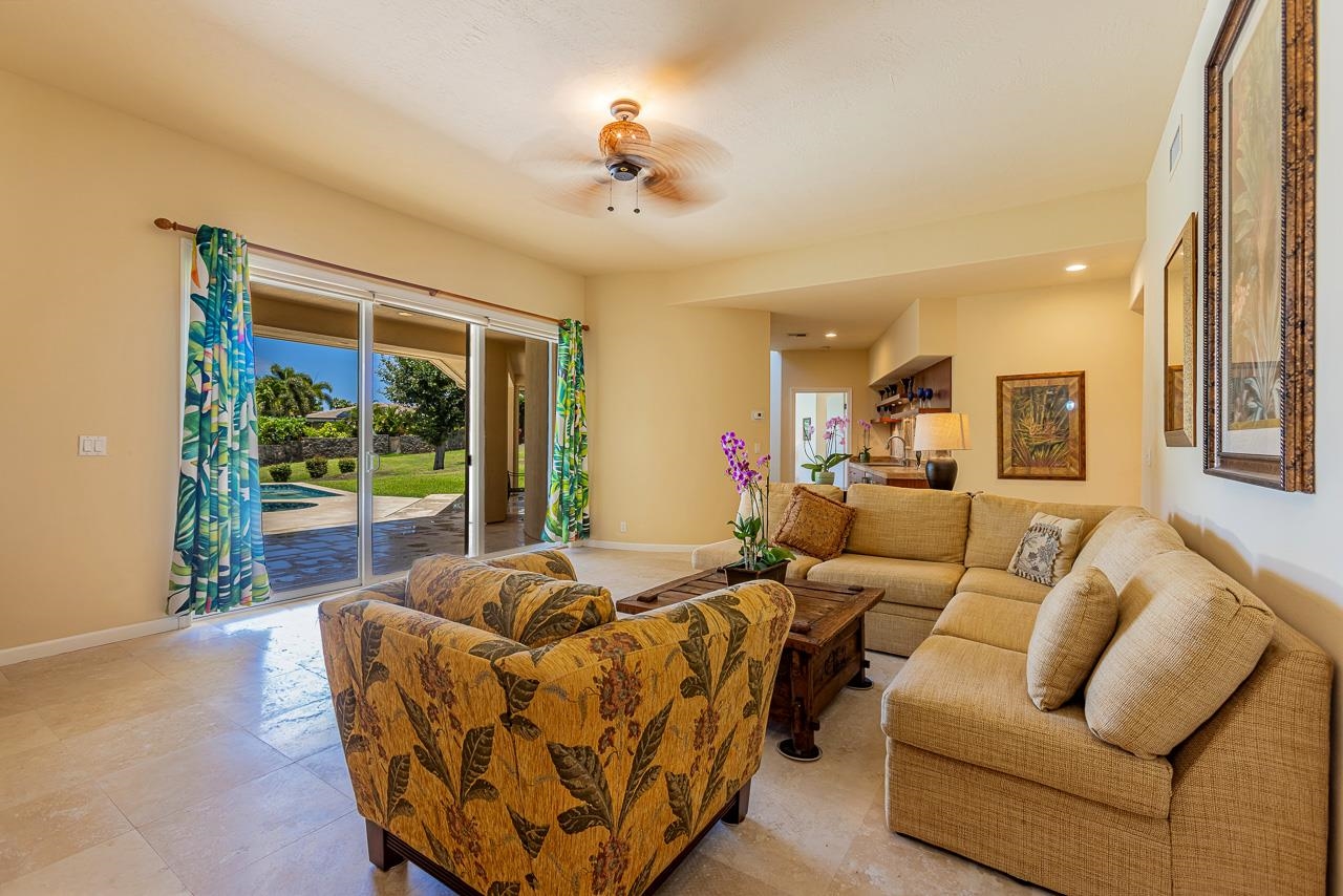 164 West Ikea Moku Place Kihei, HI 96753 - Photo 40 of 49 a living room with furniture and a large window