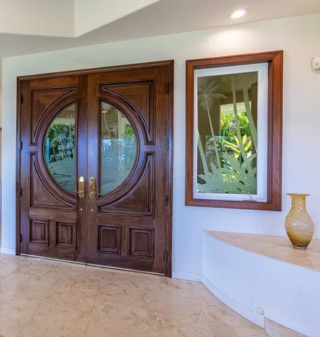 a view of livingroom with furniture and front door