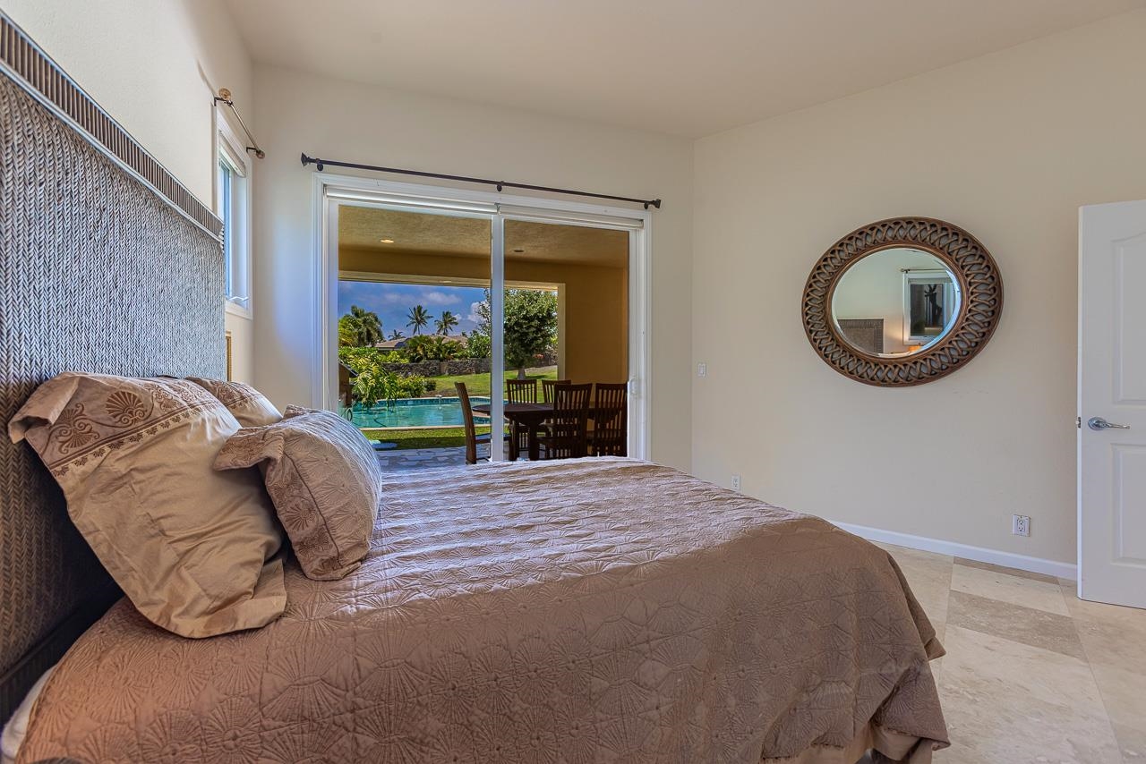 164 West Ikea Moku Place Kihei, HI 96753 - Photo 42 of 49 a bedroom with a bed and a window