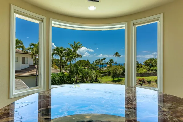 a view of a house with a swimming pool
