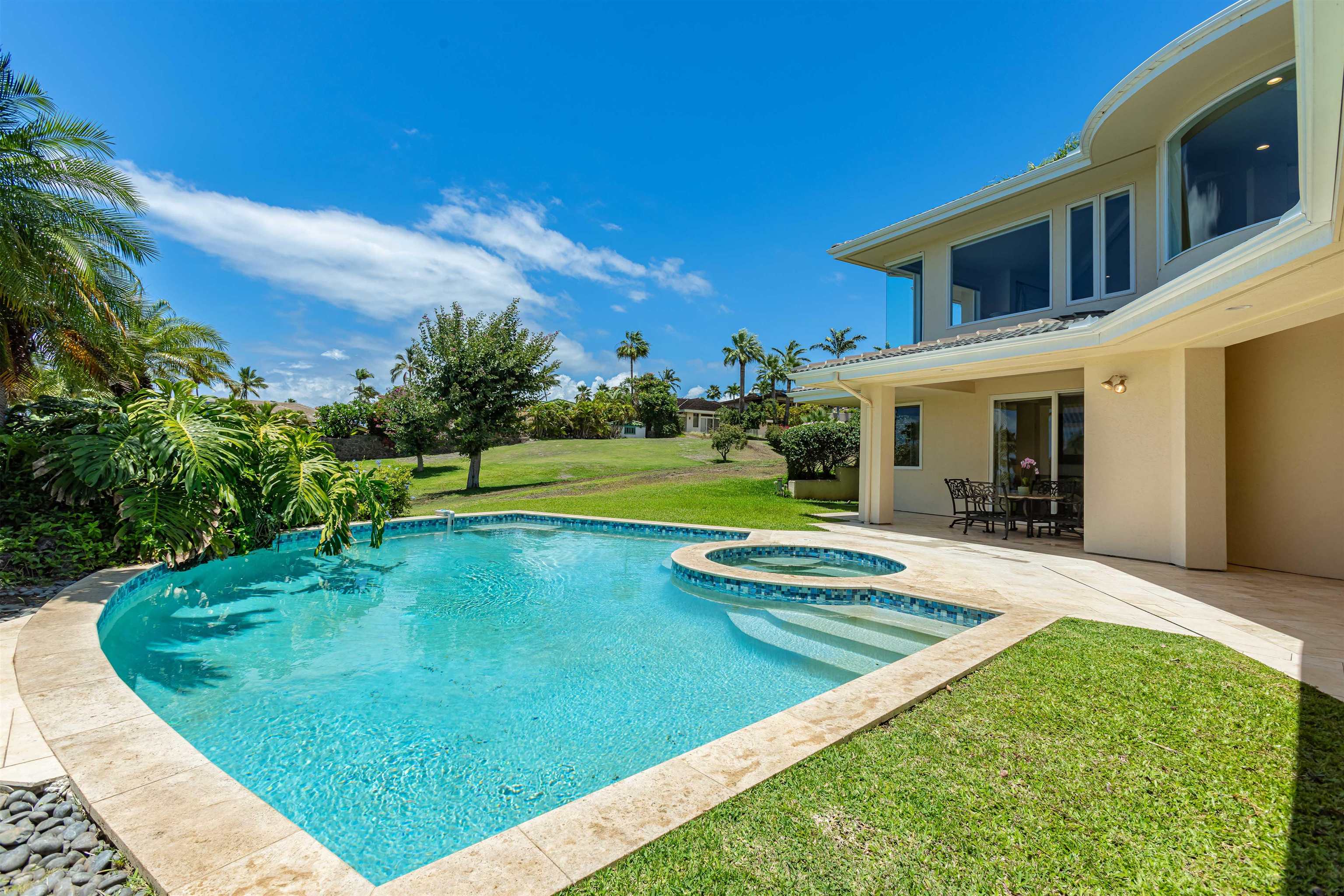 164 West Ikea Moku Place Kihei, HI 96753 - Photo 7 of 49 a view of a house with a swimming pool
