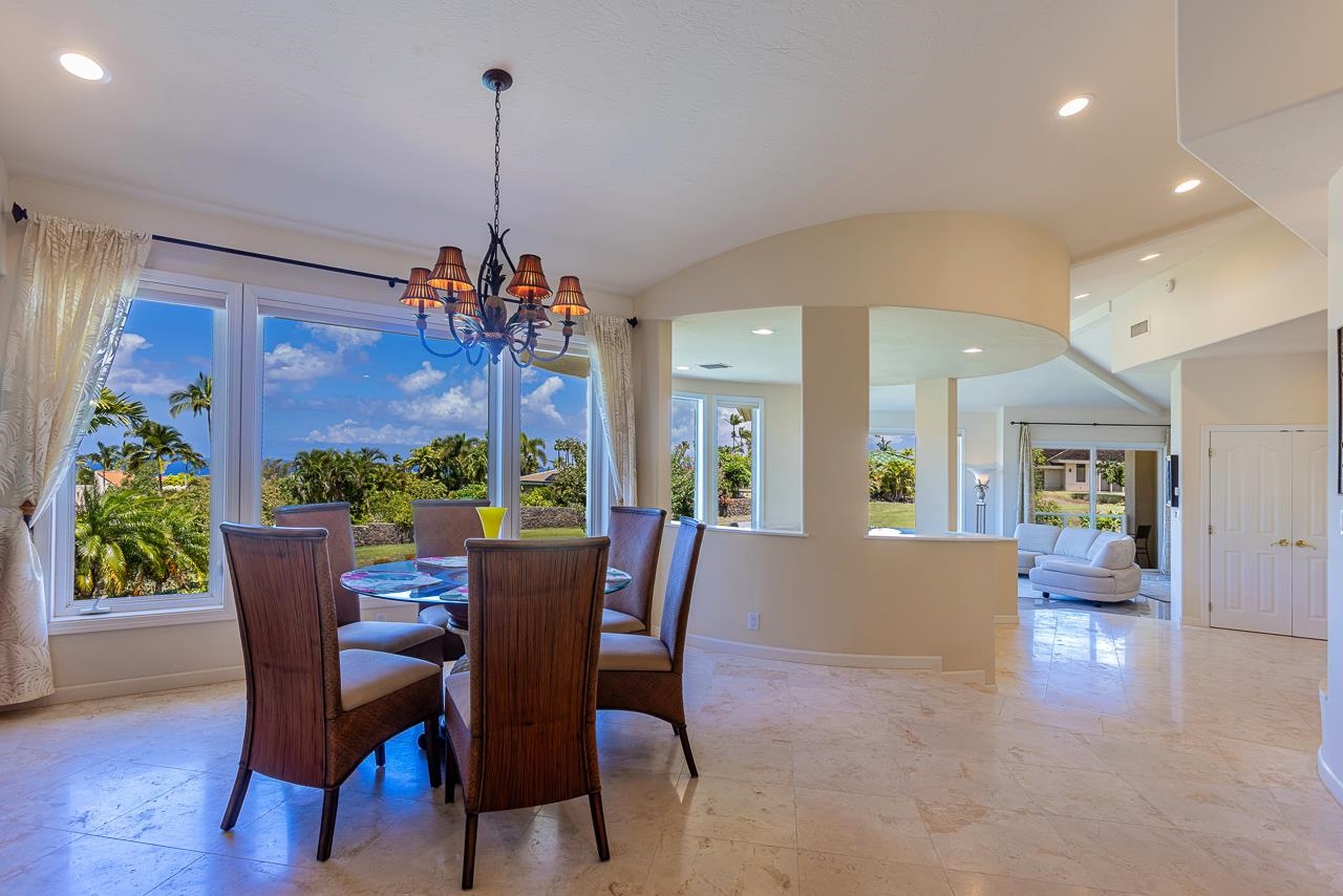 164 West Ikea Moku Place Kihei, HI 96753 - Photo 9 of 49 a view of a dining room with furniture window and wooden floor