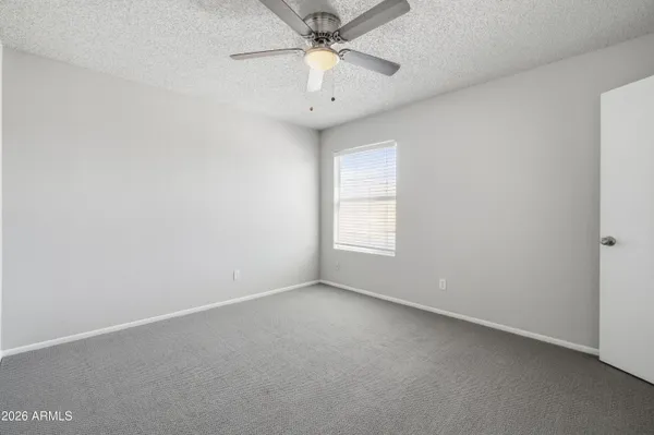 a view of entryway with flower plants