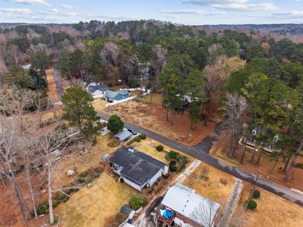 347 Laurel Lane Stockbridge, GA 30281 - Photo 4 of 7 an aerial view of residential houses with outdoor space
