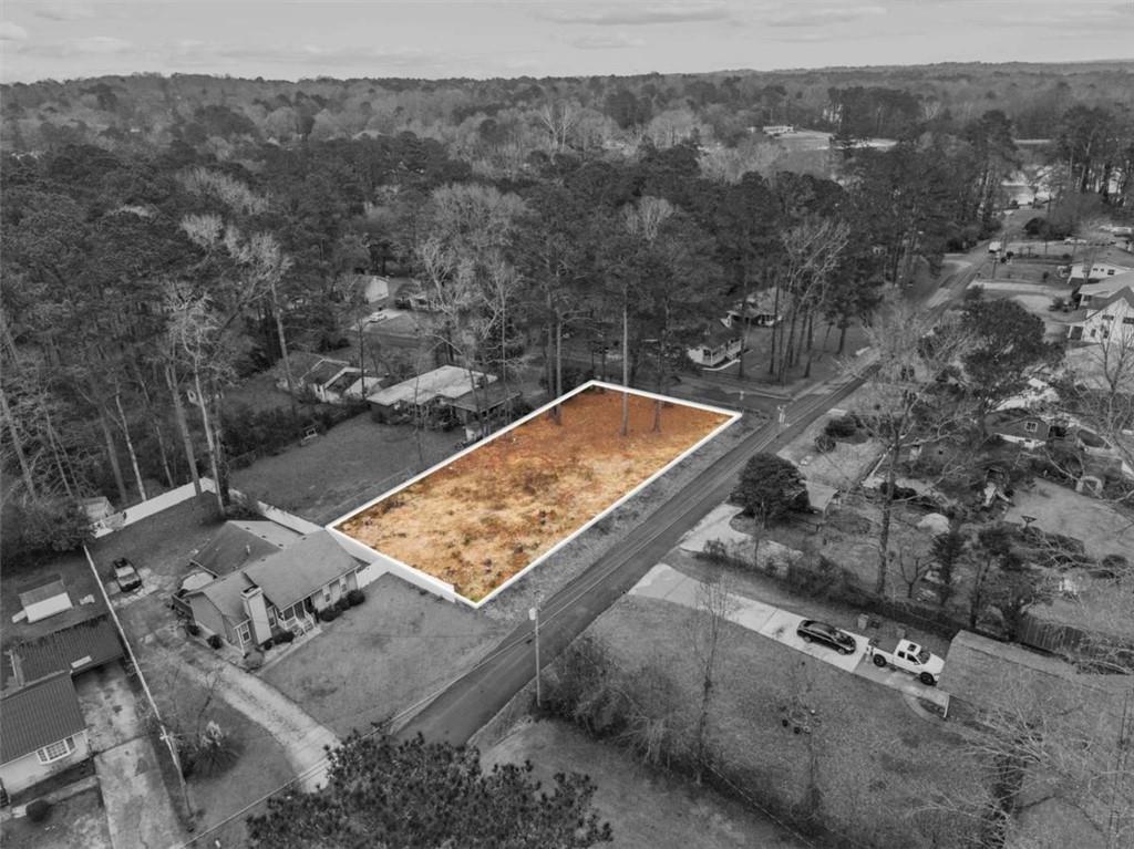 347 Laurel Lane Stockbridge, GA 30281 - Photo 7 of 7 an aerial view of house with a yard