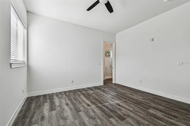 a view of a kitchen from the hallway