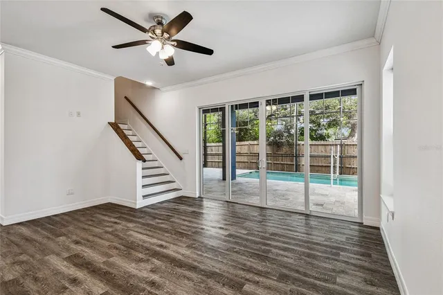 an aerial view of a house with a lake view
