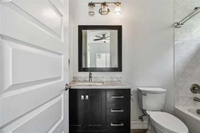 a view of swimming pool with a lounge chair