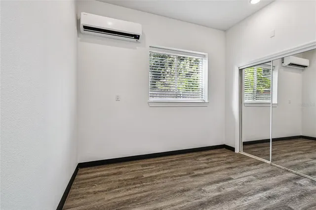 an aerial view of a house with a garden