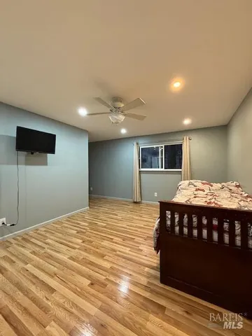 a view of an empty room with a bathroom