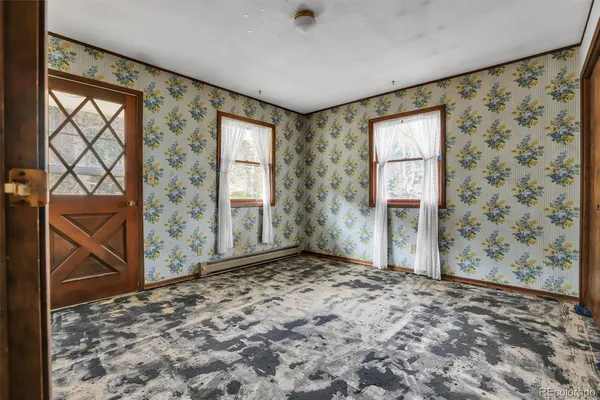 an empty room with windows