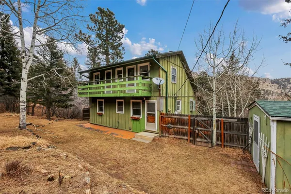a house view with a outdoor space