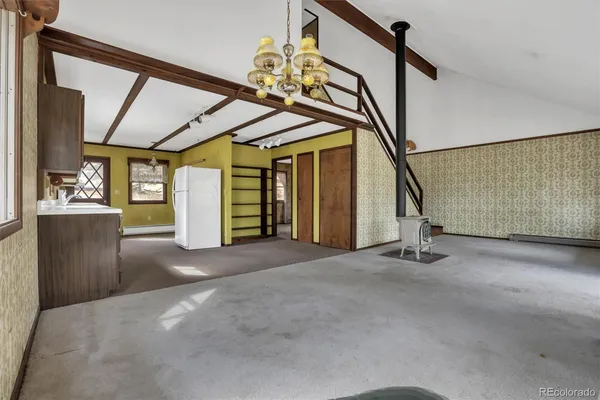 a view of an entryway with a front door