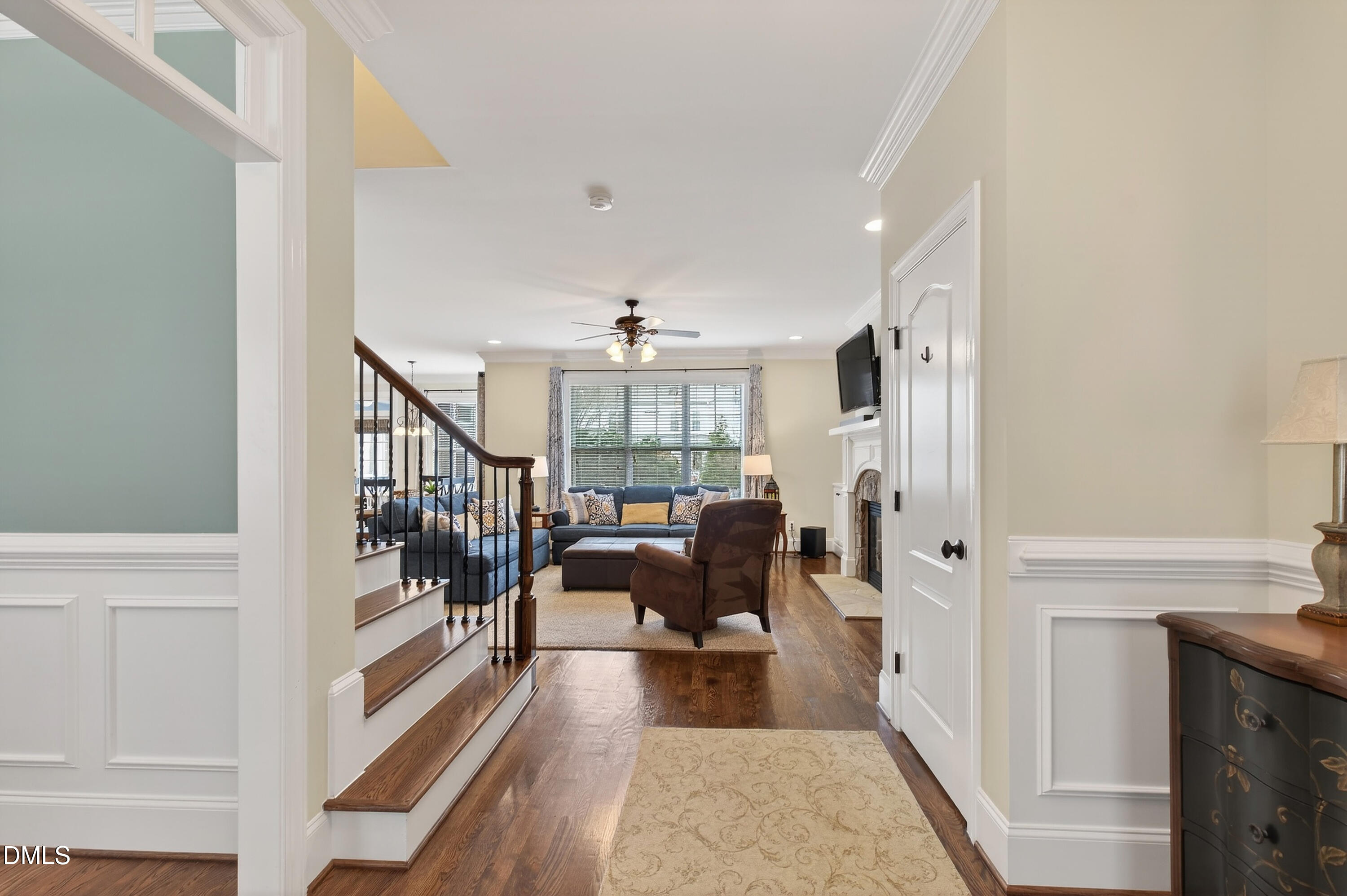 417 Wanderview Lane Holly Springs, NC 27540 - Photo 8 of 86 a living room with furniture and a fireplace