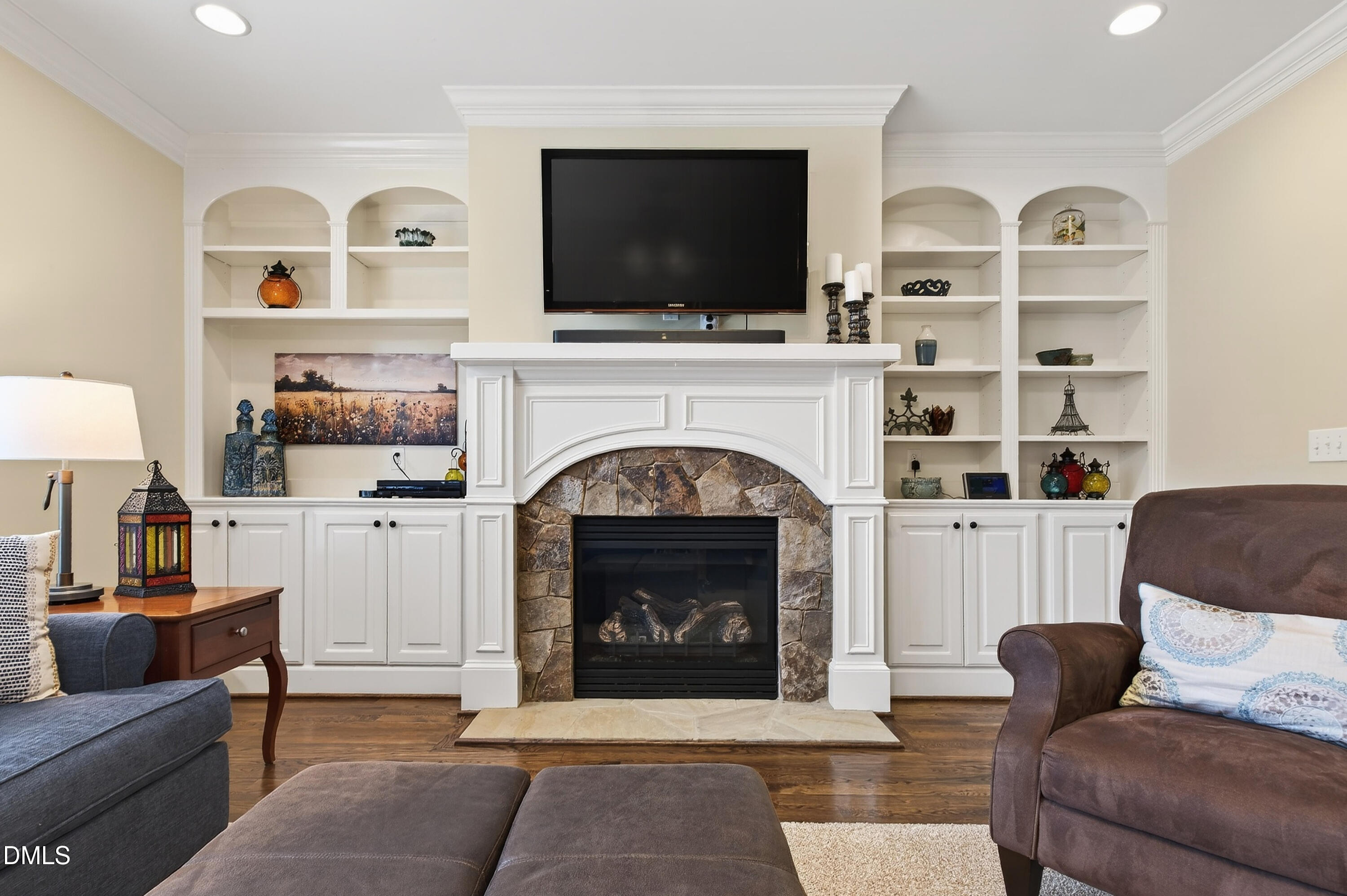 417 Wanderview Lane Holly Springs, NC 27540 - Photo 17 of 86 a living room with furniture and a fireplace