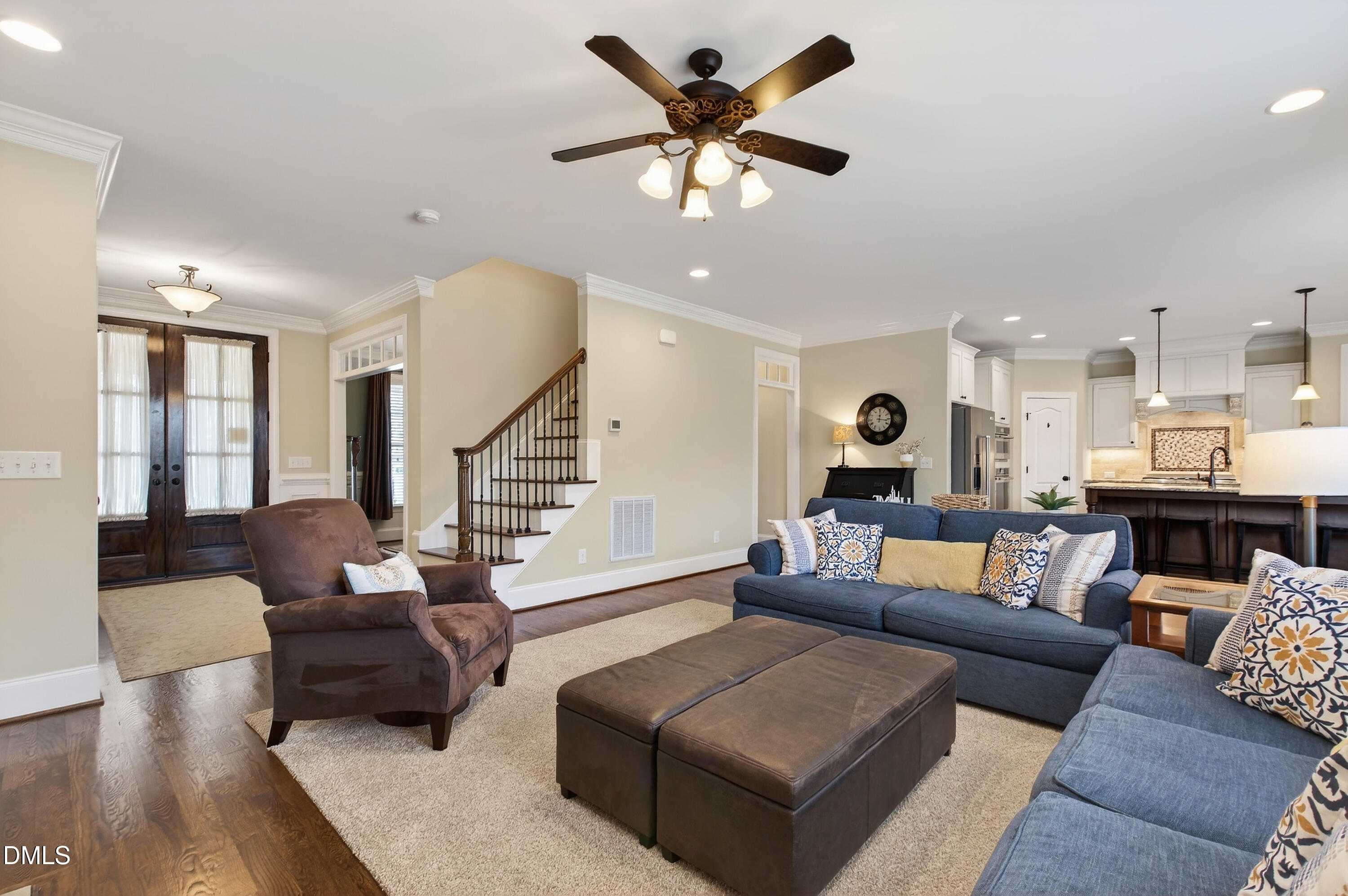 417 Wanderview Lane Holly Springs, NC 27540 - Photo 18 of 86 a living room with furniture and kitchen view