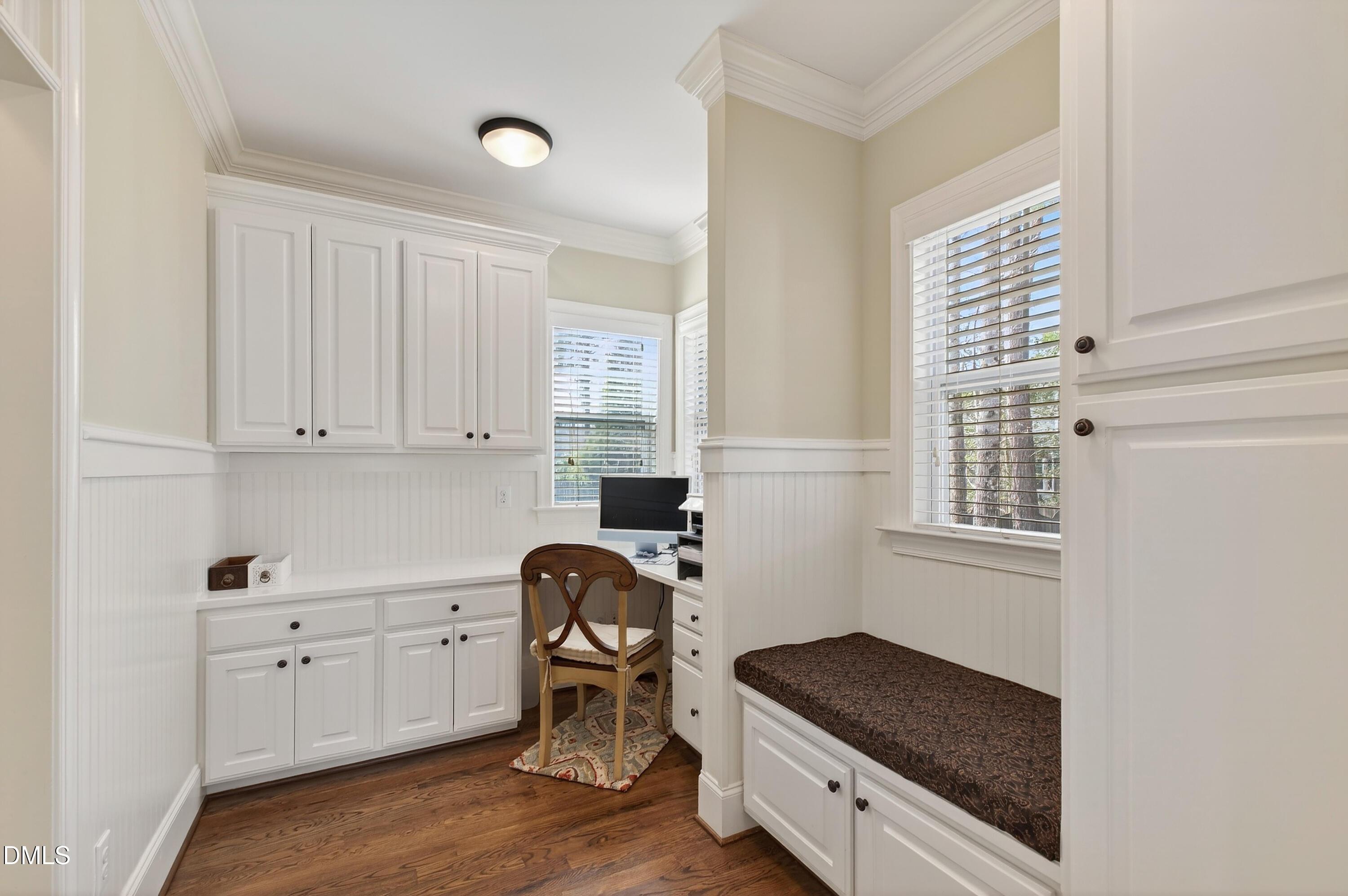 417 Wanderview Lane Holly Springs, NC 27540 - Photo 28 of 86 a kitchen with granite countertop white cabinets and white appliances