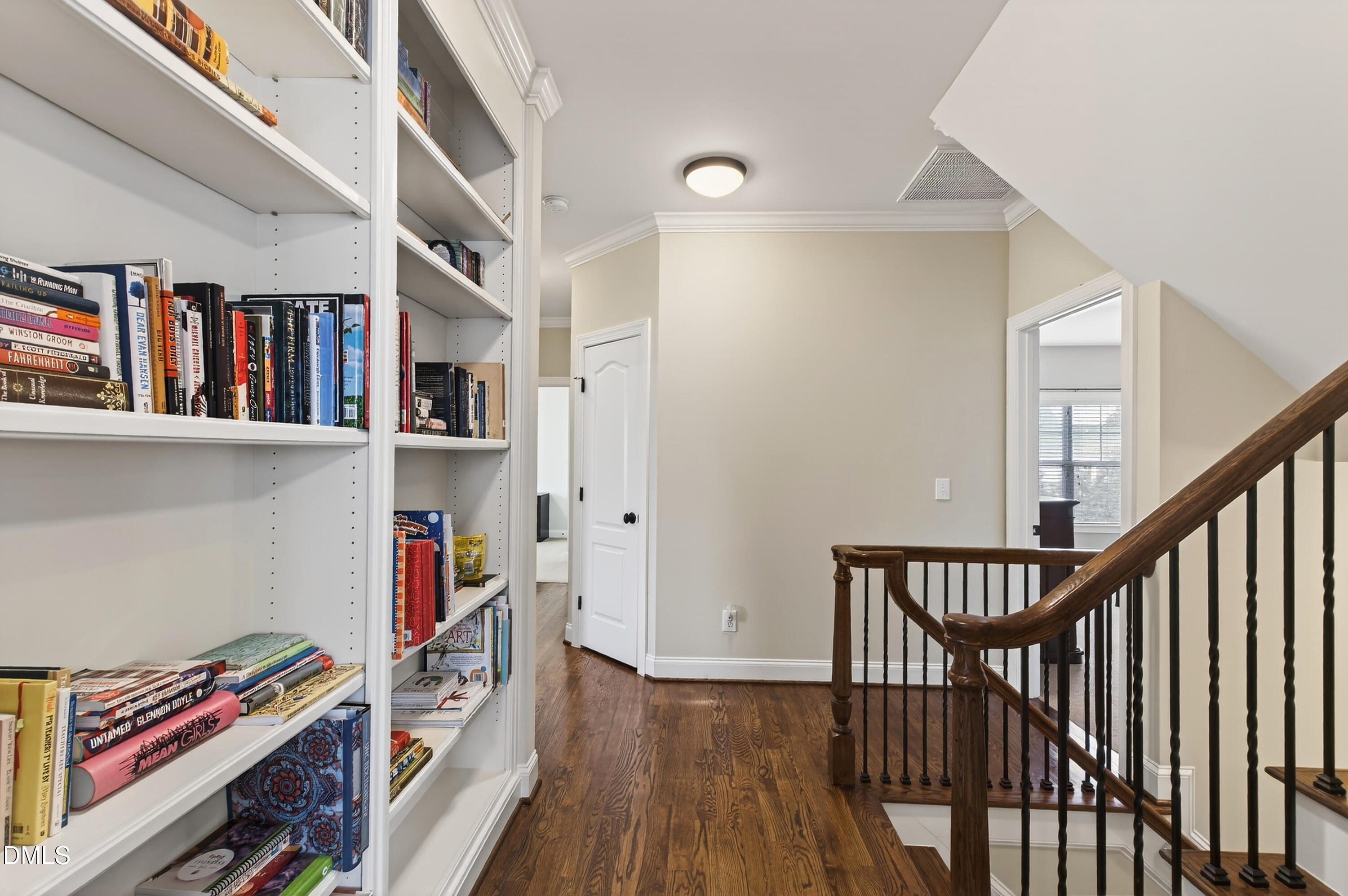 417 Wanderview Lane Holly Springs, NC 27540 - Photo 34 of 86 a view of a hallway with wooden floor and closet