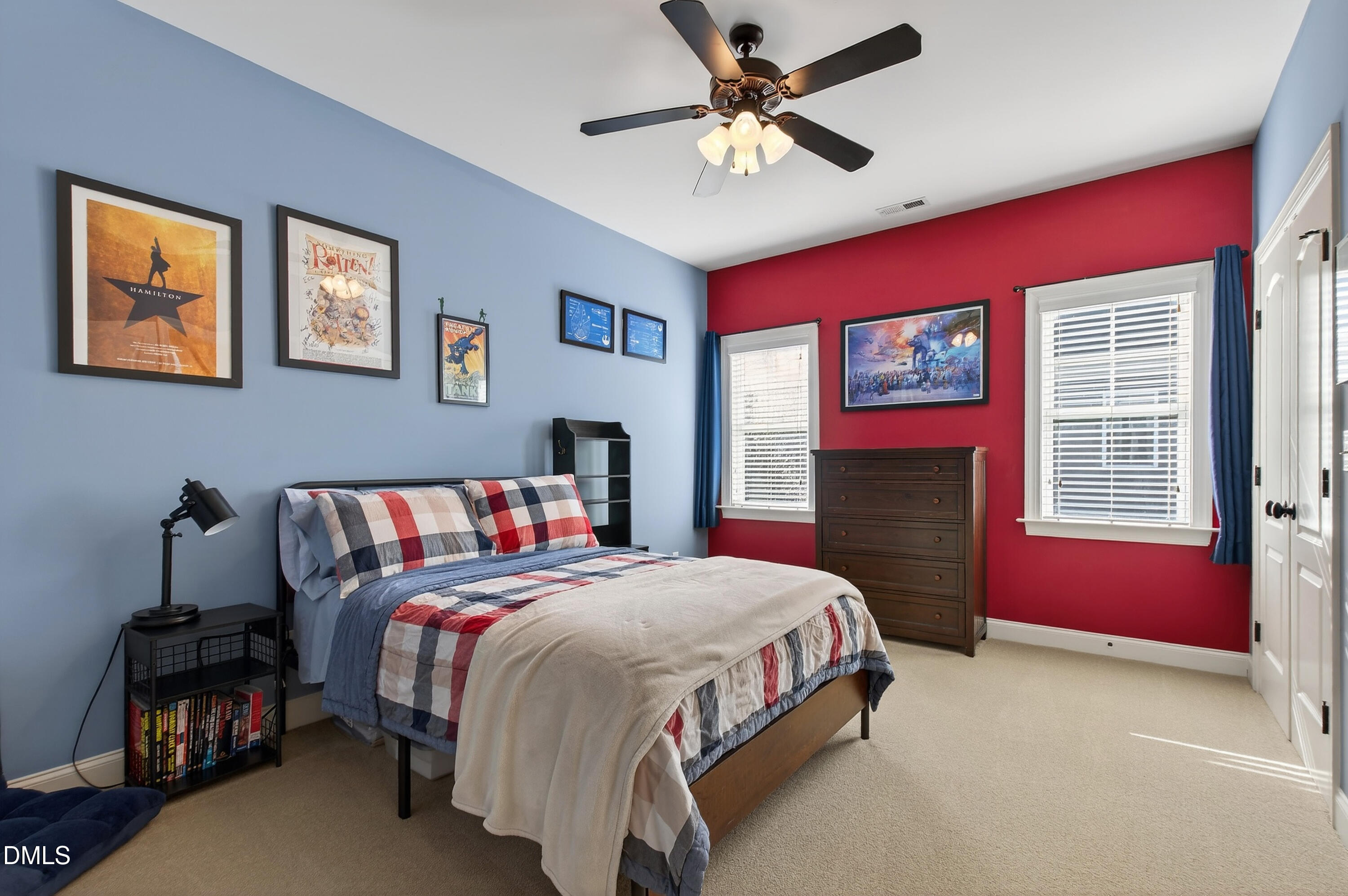 417 Wanderview Lane Holly Springs, NC 27540 - Photo 46 of 86 a bedroom with a bed and a chandelier