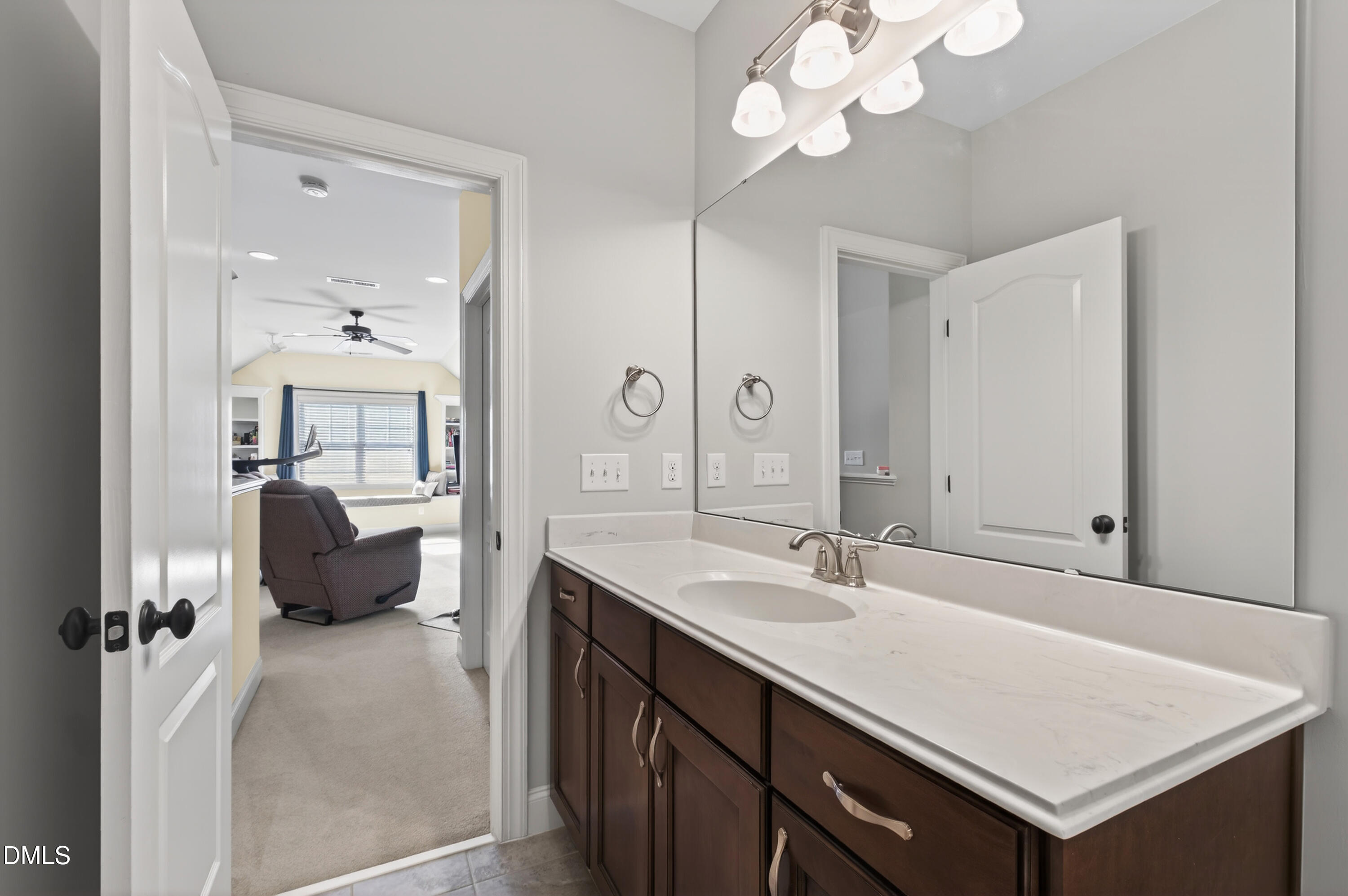 417 Wanderview Lane Holly Springs, NC 27540 - Photo 55 of 86 a en suite bathroom with a sink double vanity and a mirror