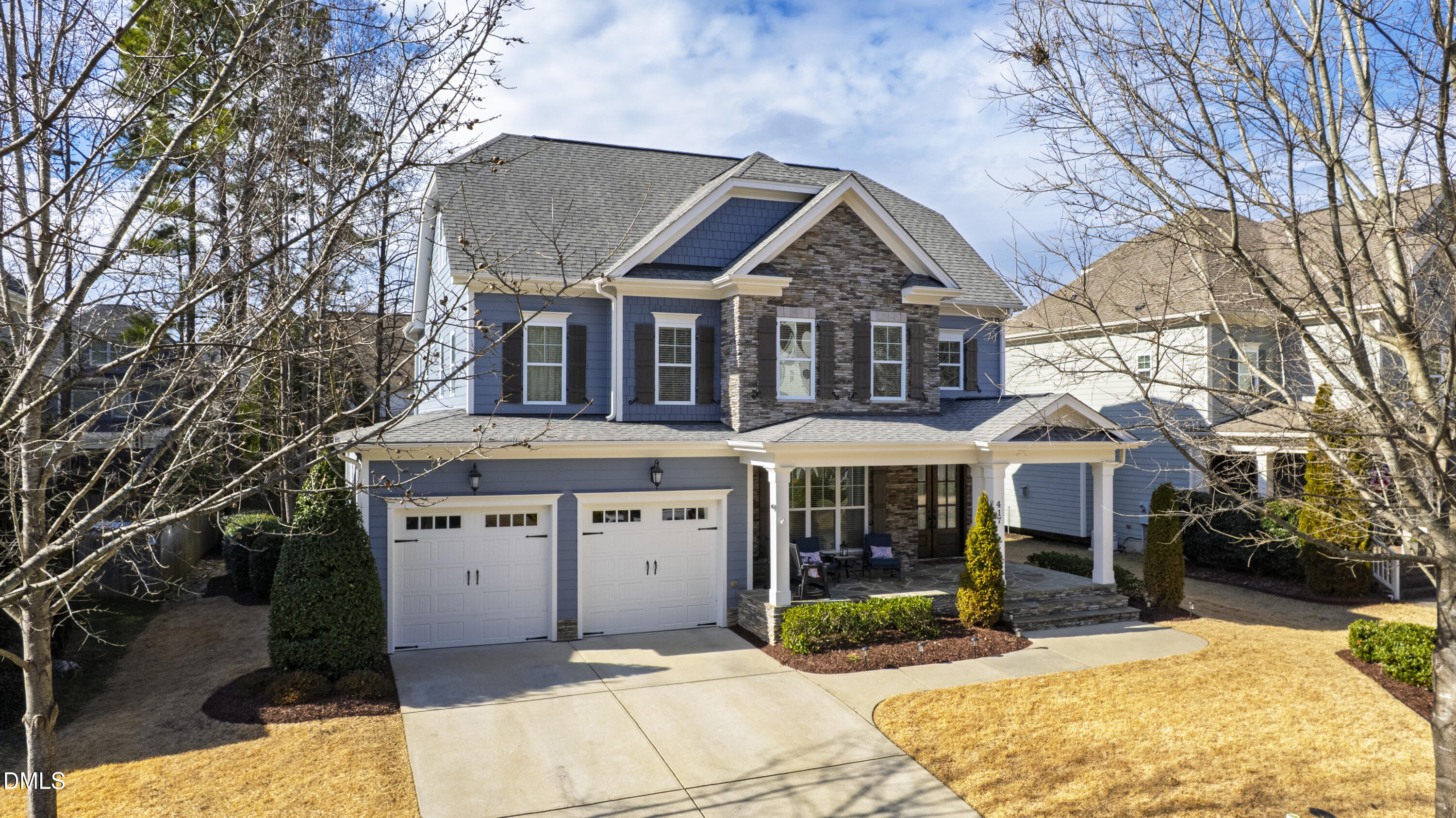 417 Wanderview Lane Holly Springs, NC 27540 - Photo 62 of 86 a front view of a house with a yard