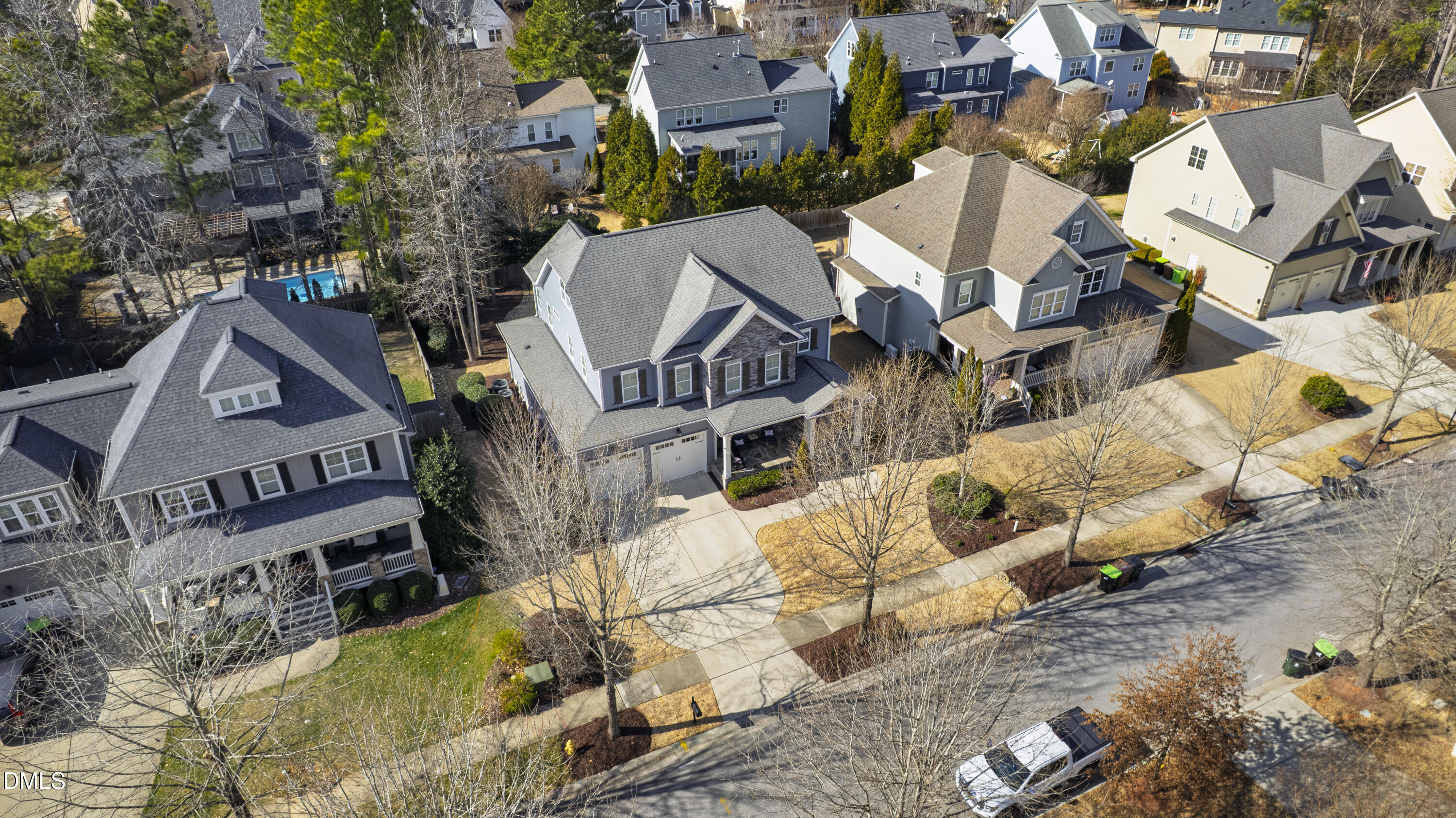 417 Wanderview Lane Holly Springs, NC 27540 - Photo 68 of 86 an aerial view of a house with a yard covered with snow