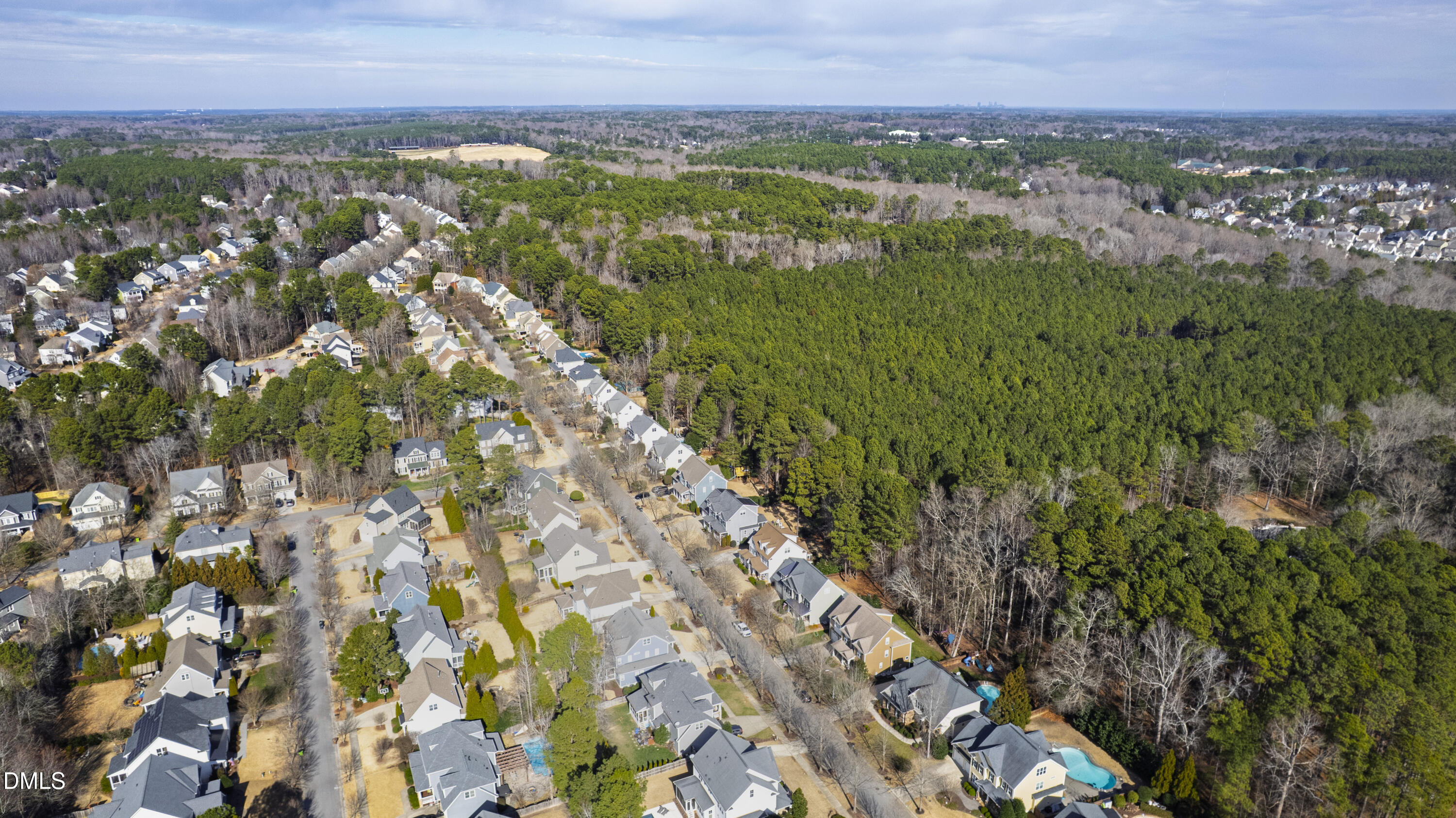 417 Wanderview Lane Holly Springs, NC 27540 - Photo 71 of 86 a view of a city with an outdoor space