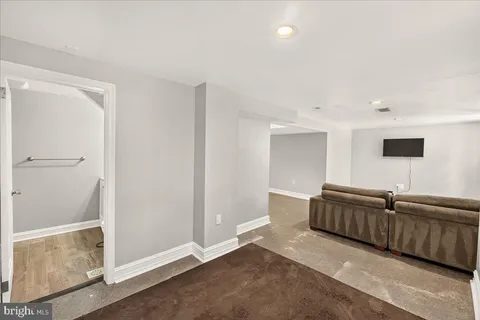a room with a couch and a window