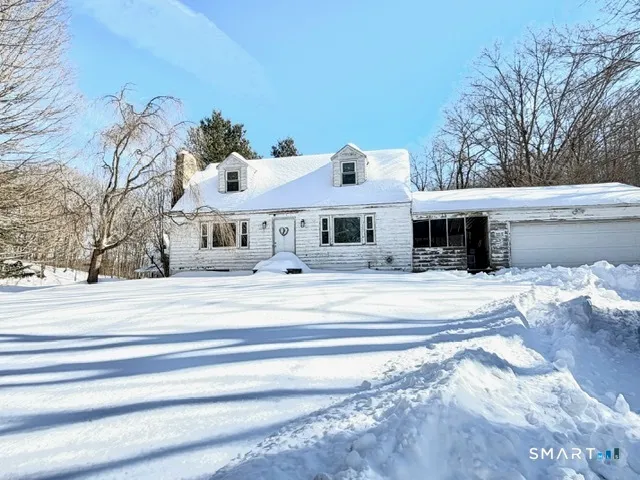 a view of a house with a patio