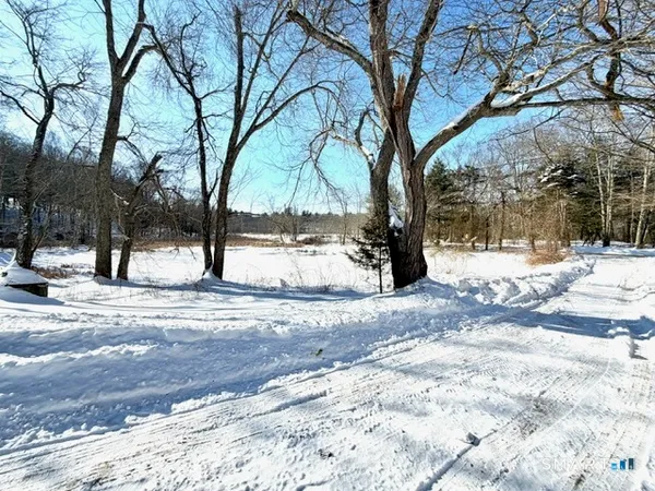 a view of road with covered with snow