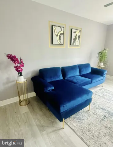 a living room with furniture and a couch