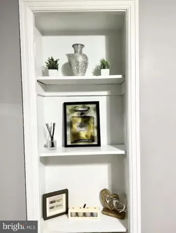 a close view of a fireplace with painting on it