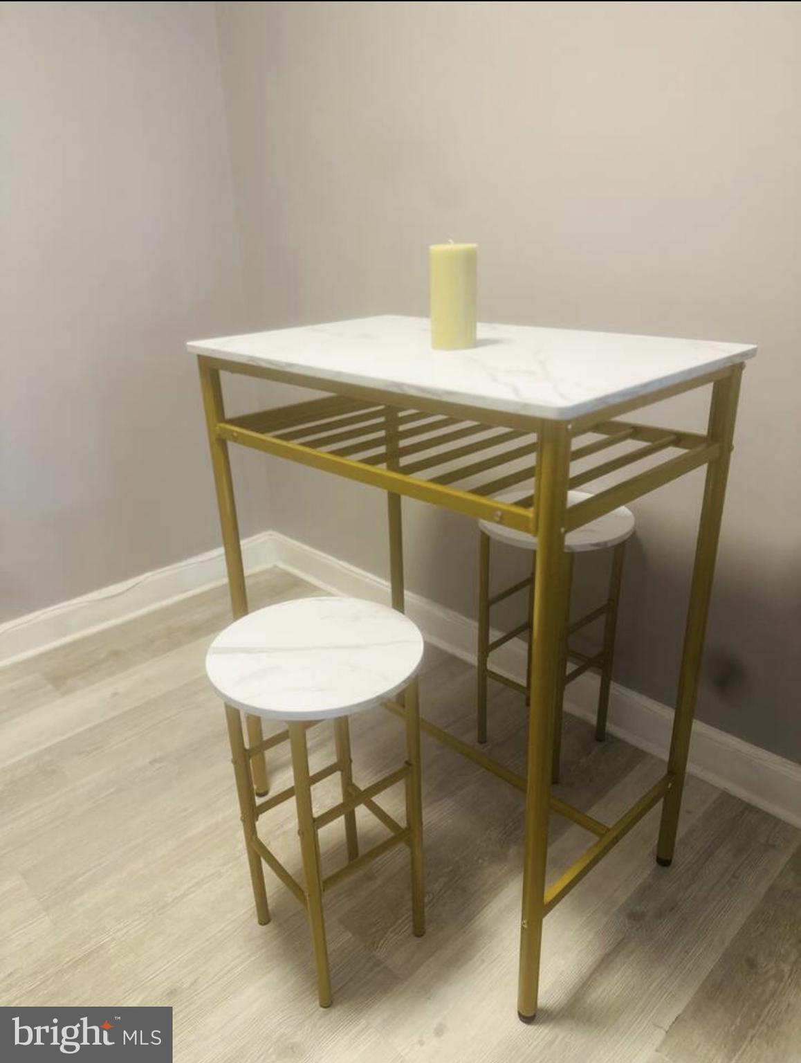 1268 Raum Street Northeast Washington, DC 20002 - Photo 21 of 46 a bathroom with a sink a mirror and a shower