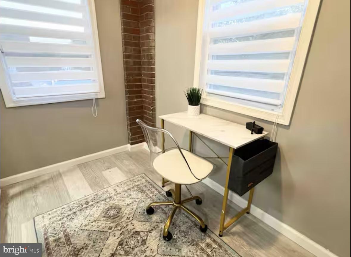 1268 Raum Street Northeast Washington, DC 20002 - Photo 32 of 46 a bathroom with a sink and a mirror