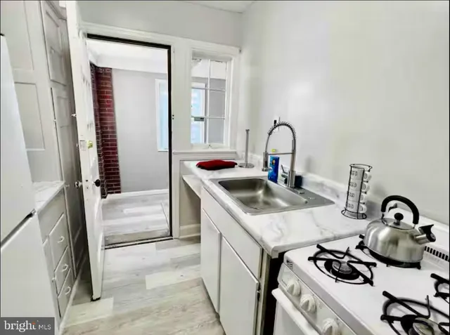 a bedroom with a bed and closet