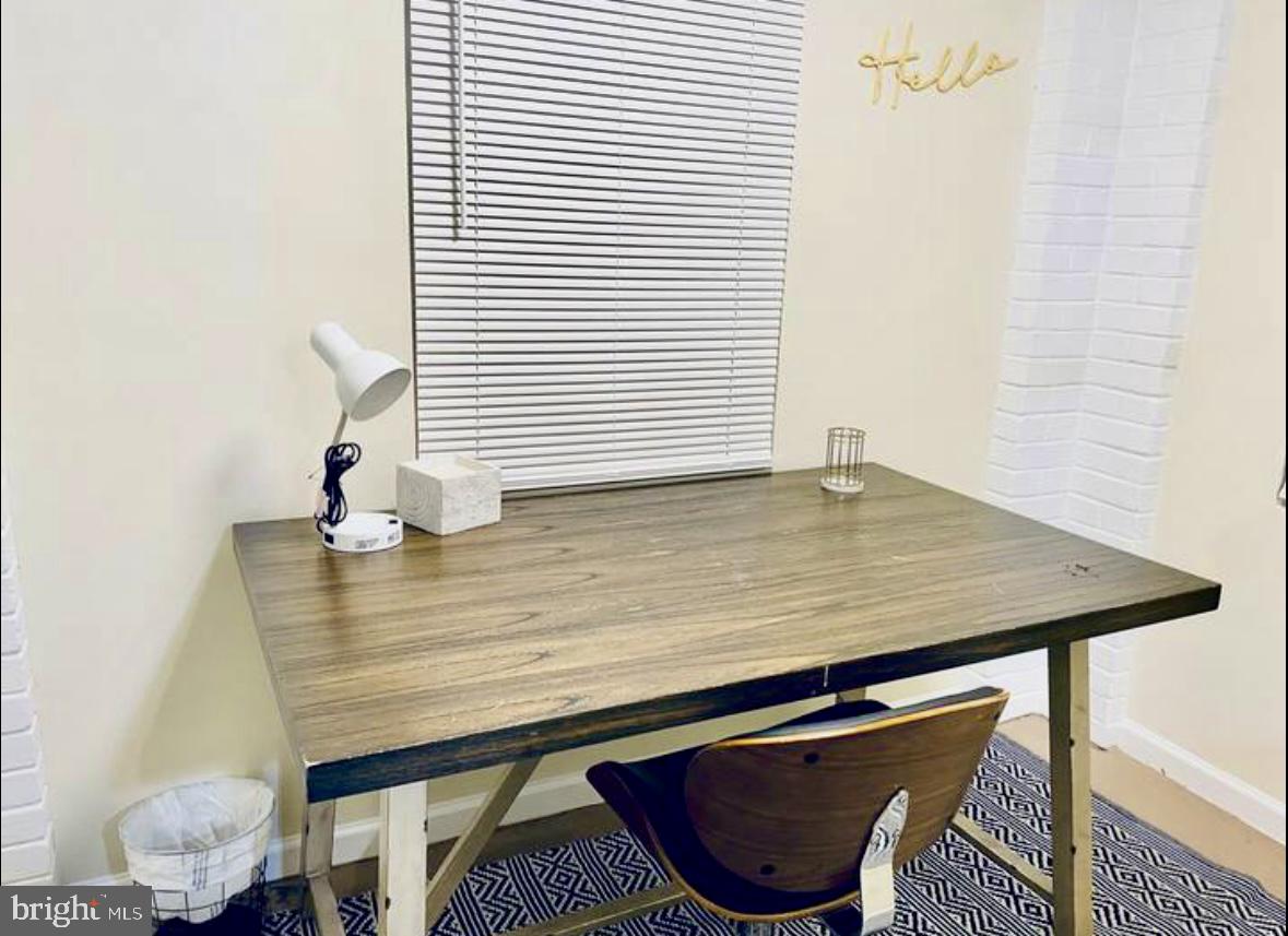 1268 Raum Street Northeast Washington, DC 20002 - Photo 5 of 46 a view of a room with a table and chair