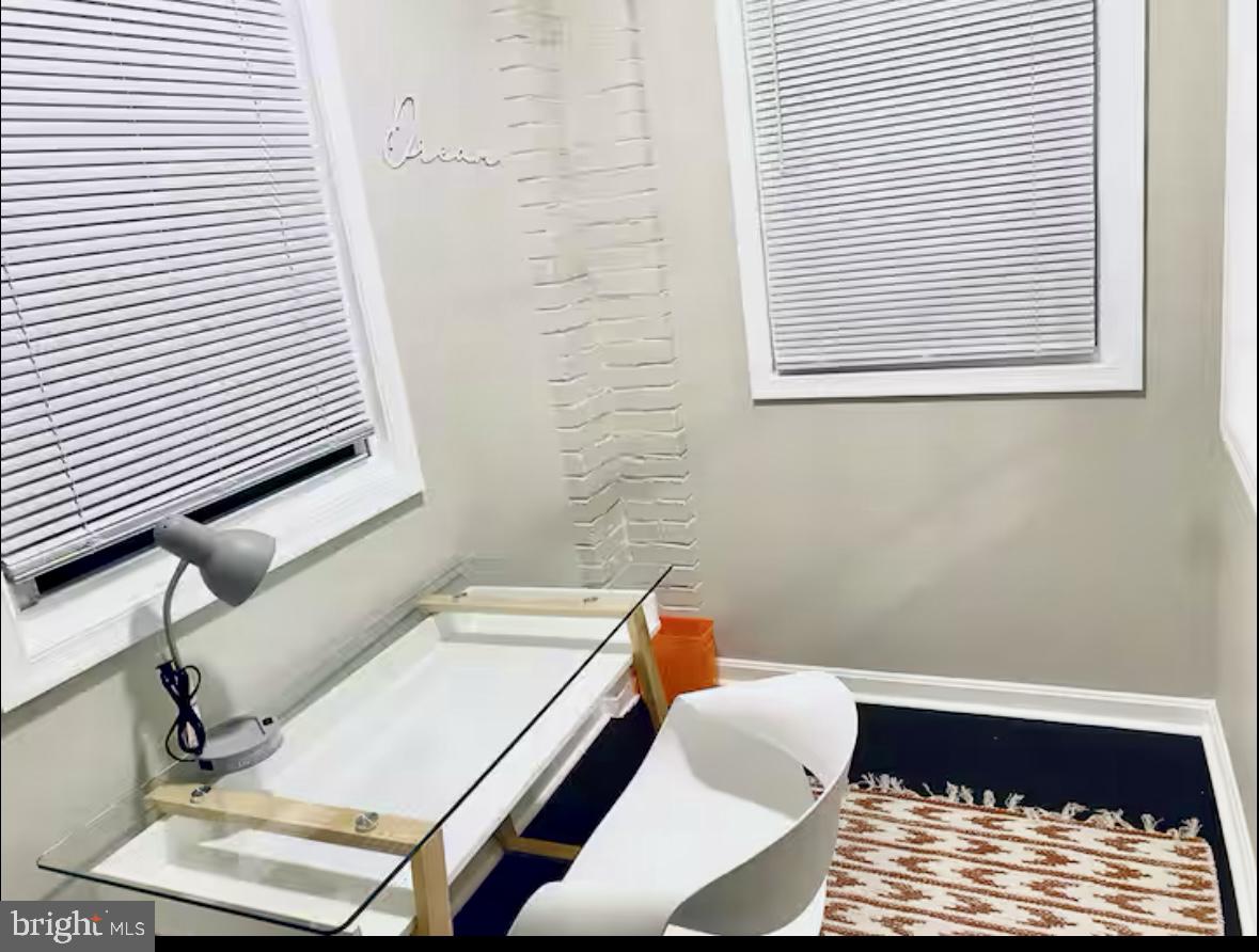 1268 Raum Street Northeast Washington, DC 20002 - Photo 9 of 46 a bathroom with a sink and a window