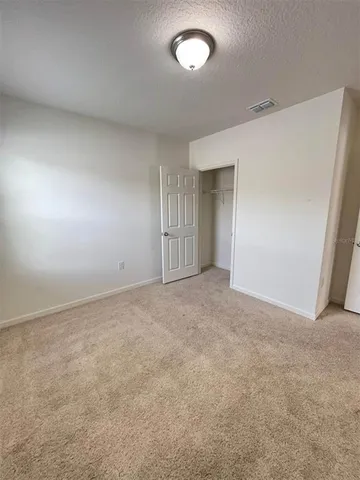 an empty room with a natural light