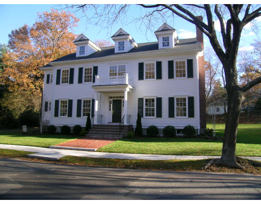 183 Middlesex Road Brookline, MA 02467 - Photo 1 of 16 a front view of a house with a yard