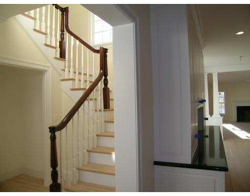 183 Middlesex Road Brookline, MA 02467 - Photo 16 of 16 a view of entryway and hall with wooden floor