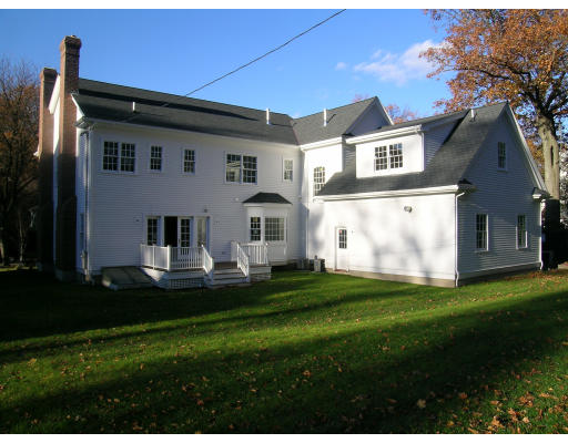 183 Middlesex Road Brookline, MA 02467 - Photo 2 of 16 a front view of house with a garden